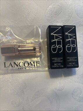 2 NARS mini Lipsticks and 1 Lancome mini lip balm